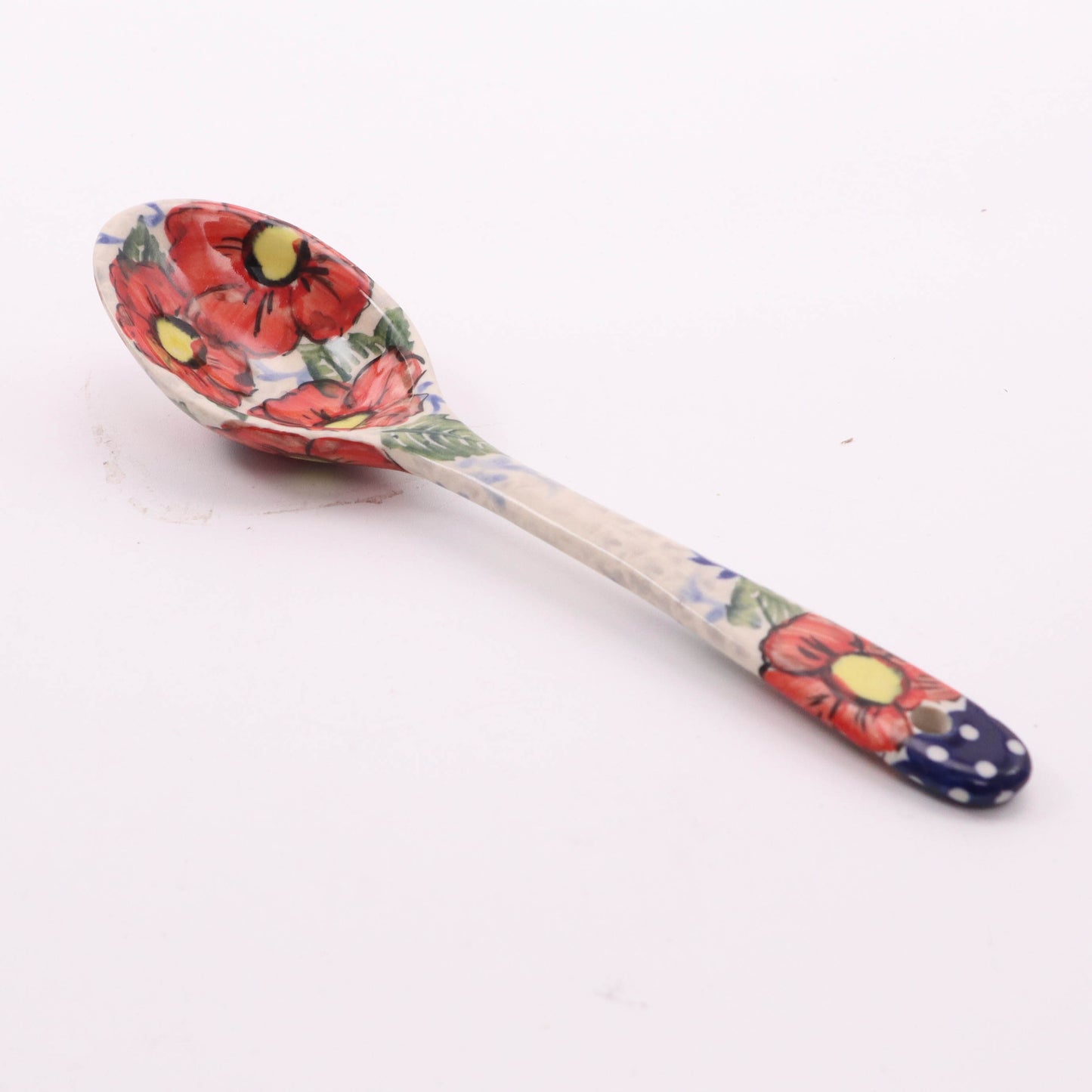 8" Serving Spoon. Pattern: E