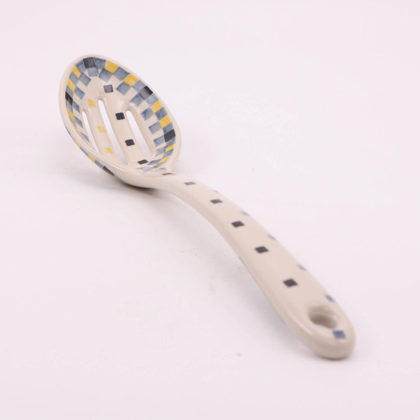 12" Slotted Spoon. Pattern: Celebration