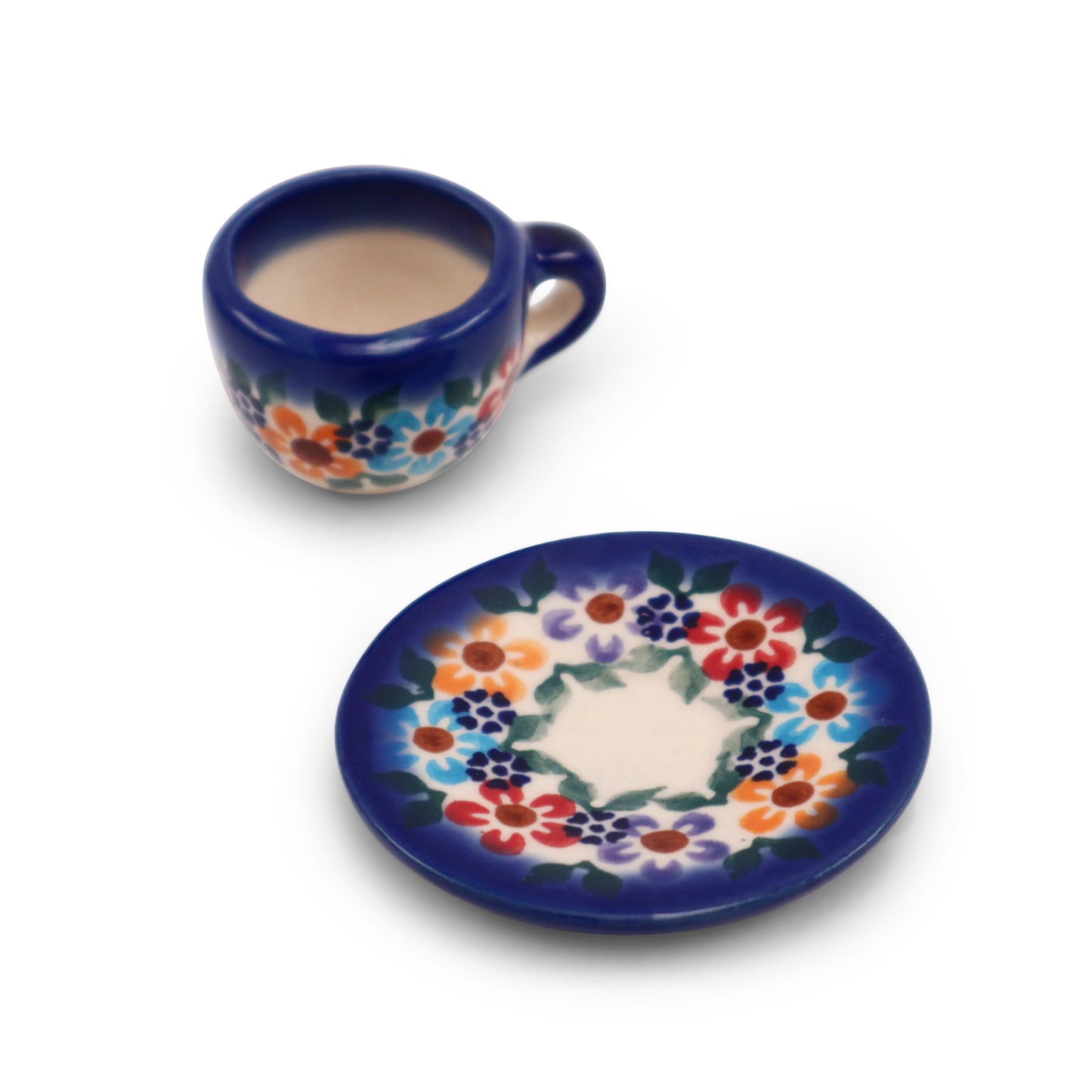 Mini Cup and Saucer.Pattern: Daisies