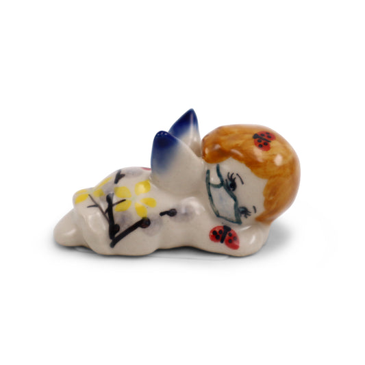 3"x2" Reclining Masked Angel Figurine LE.Pattern: Spring