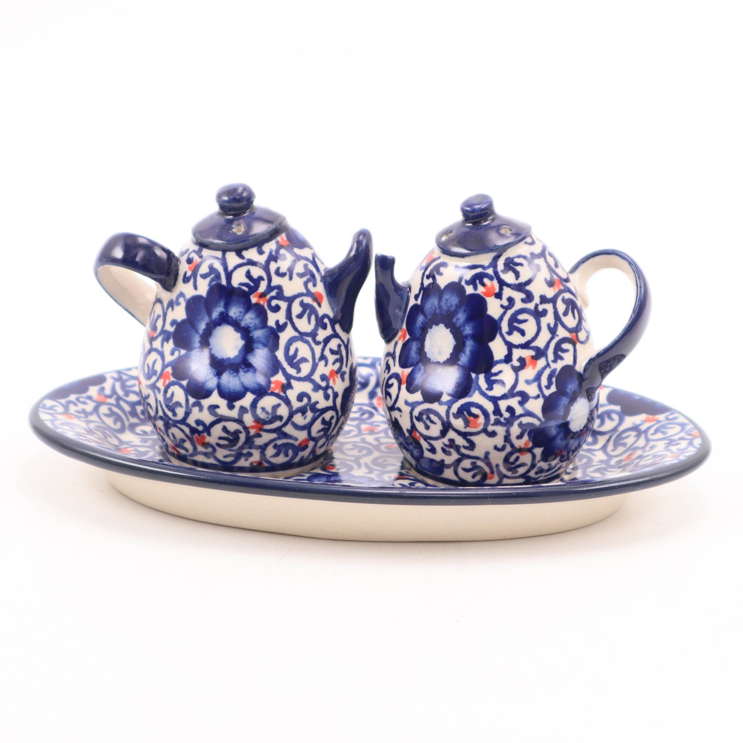 Hand Formed Salt and Pepper Shakers on Oval Tray. Pattern: Cobalt Fireworks