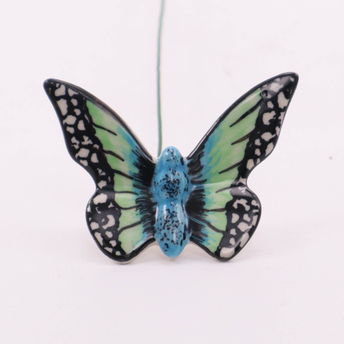 Butterfly on Stem. Pattern: Aqua