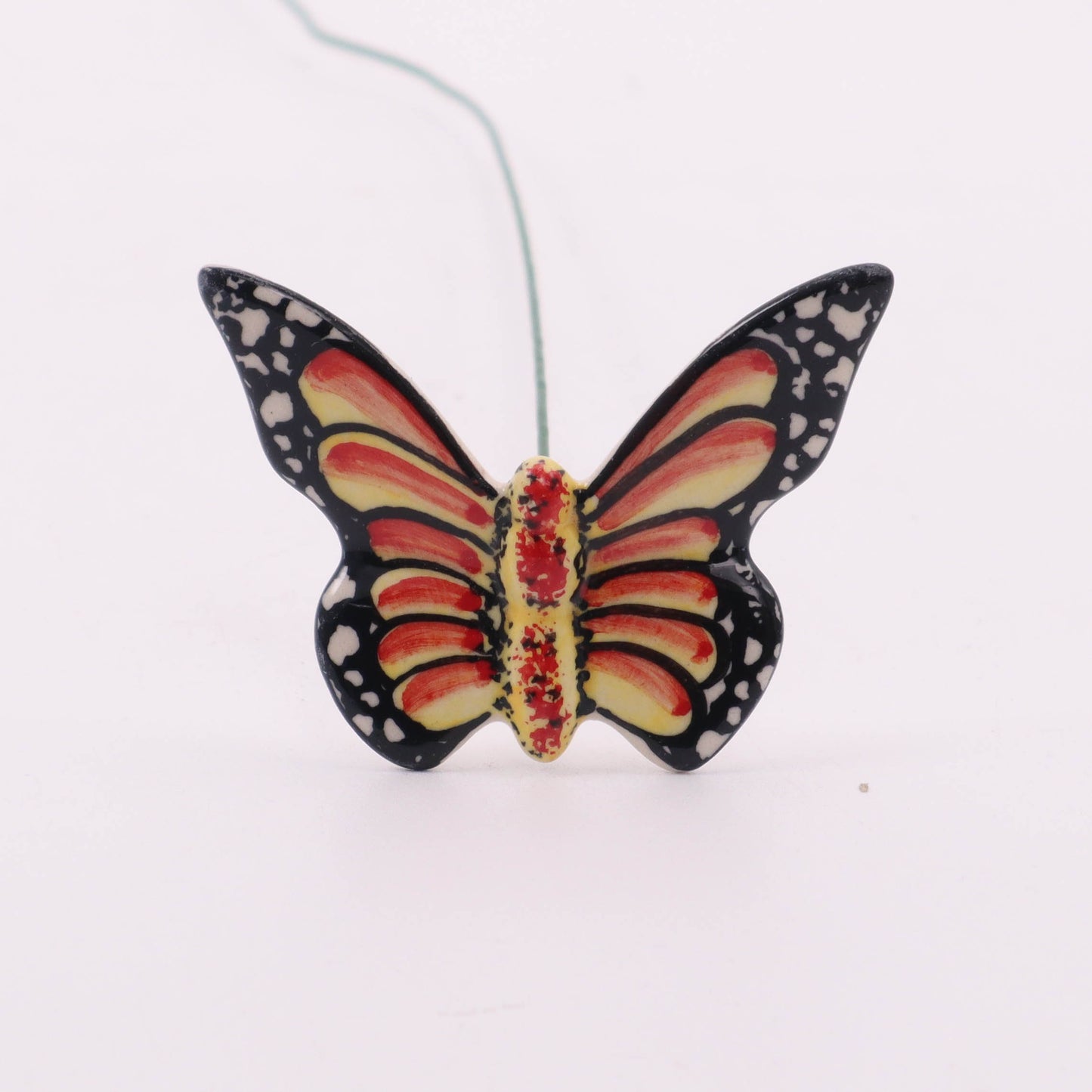 Butterfly on Stem. Pattern: Orange