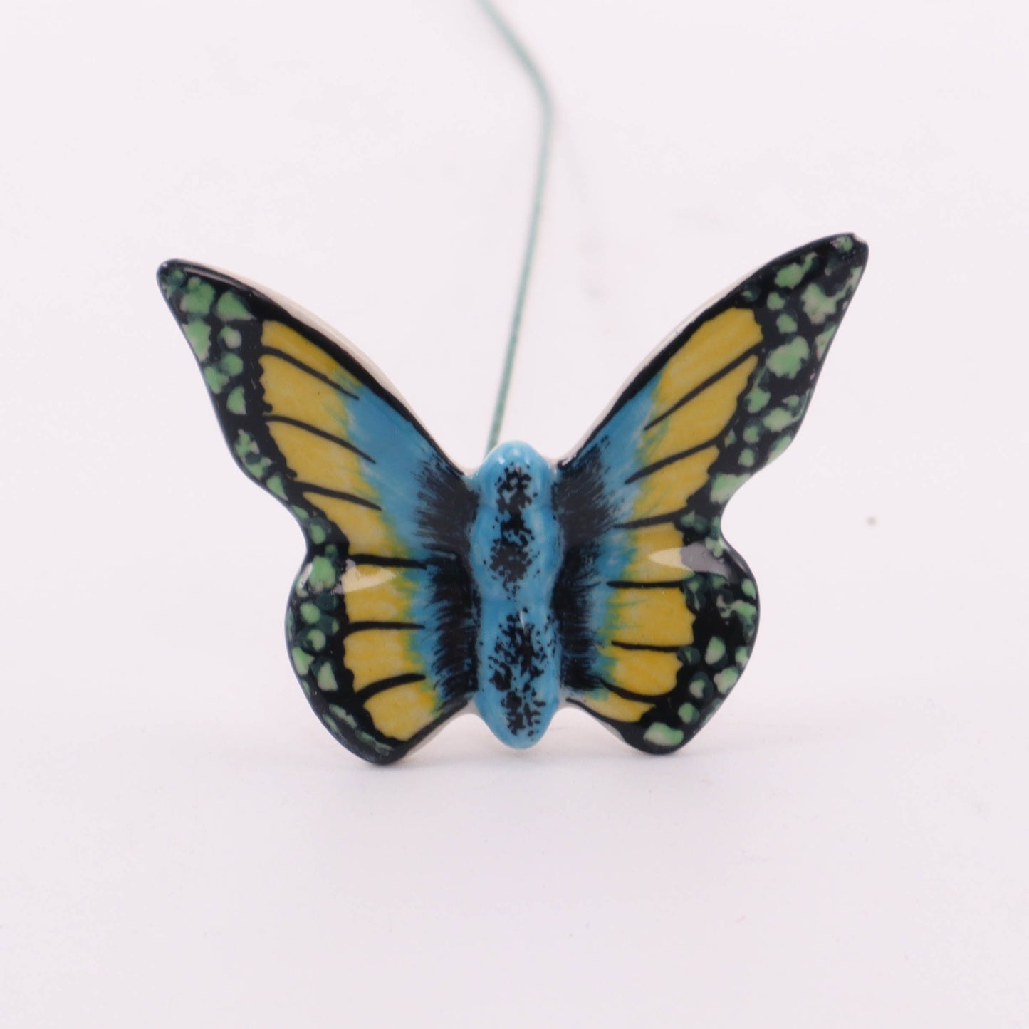 Butterfly on Stem. Pattern: Blue