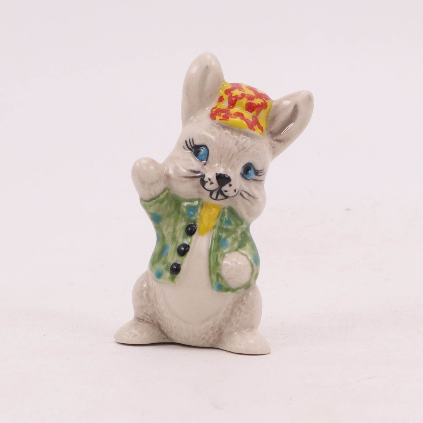 3" Waving Bunny Figurine. Pattern: Yellow Hat