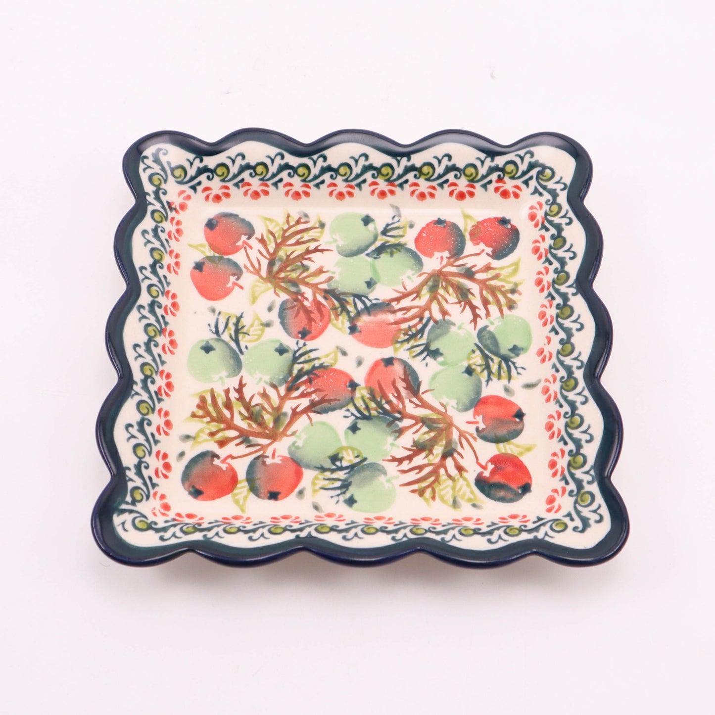 6.5" Square Ruffled Plate. Pattern: Orchard