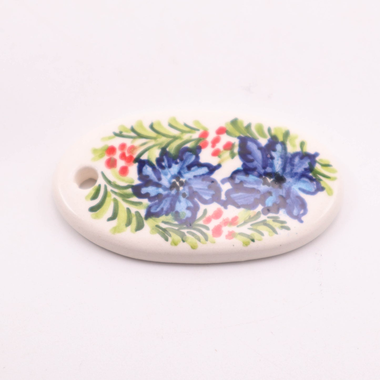 2.5" Oval Pendant. Pattern: Blue Flowers